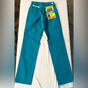 Vintage turquoise Wrangler jeans.